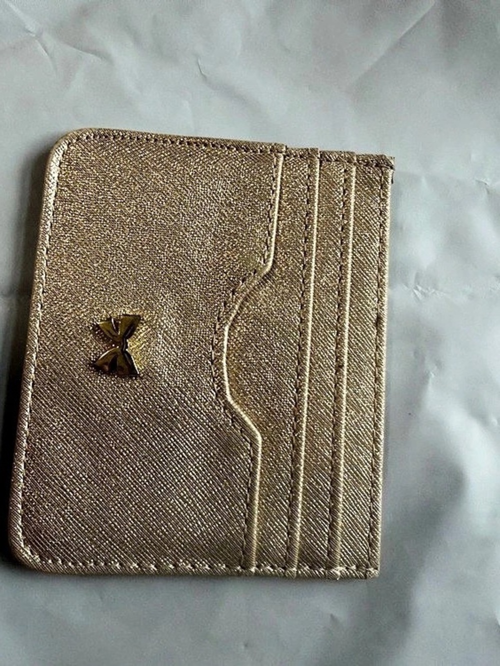 Kate Spade has Gold Wallet